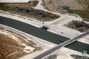 A structure known as the "intertie" helps high flow water from the Kern River flow into the California Aqueduct and on to Southern California. The intertie is used to move water owned by the Nickel family around the state. Photo by Alex Horvath.